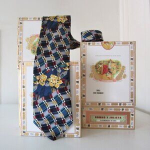 100% Silk Neck Tie with golden yellow flowers and plaid. Designed by Regency.